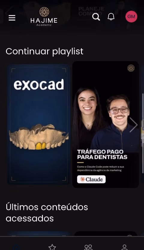 Aplicativo da Hajime Academy aberto, com a fileira Continuar playlist e as capas dos cursos de Exocad e tráfego pago.